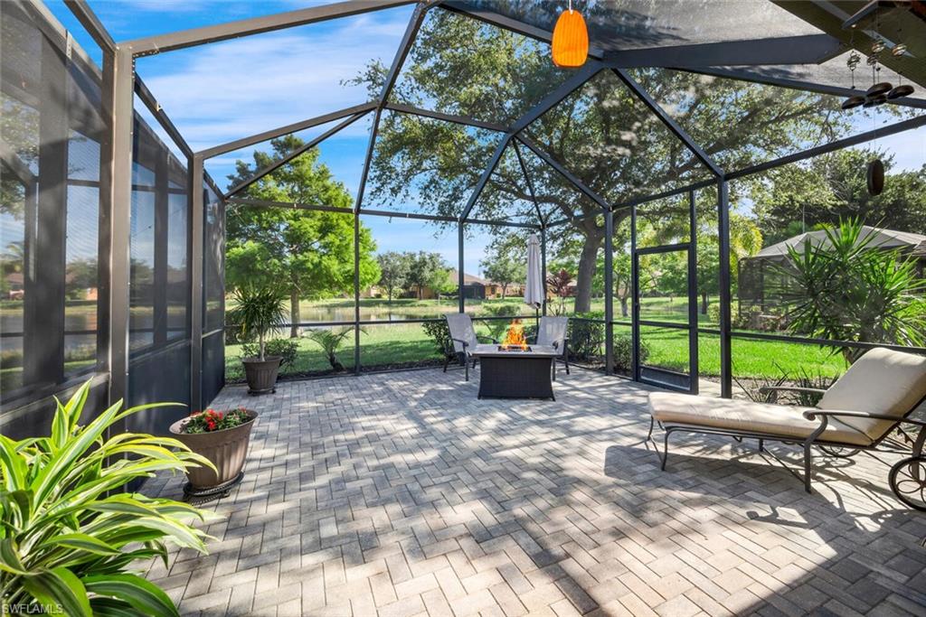 3732 Costa Maya Way Estero, FL 33928 - Photo 8 of 19 a view of a backyard with sitting area and garden