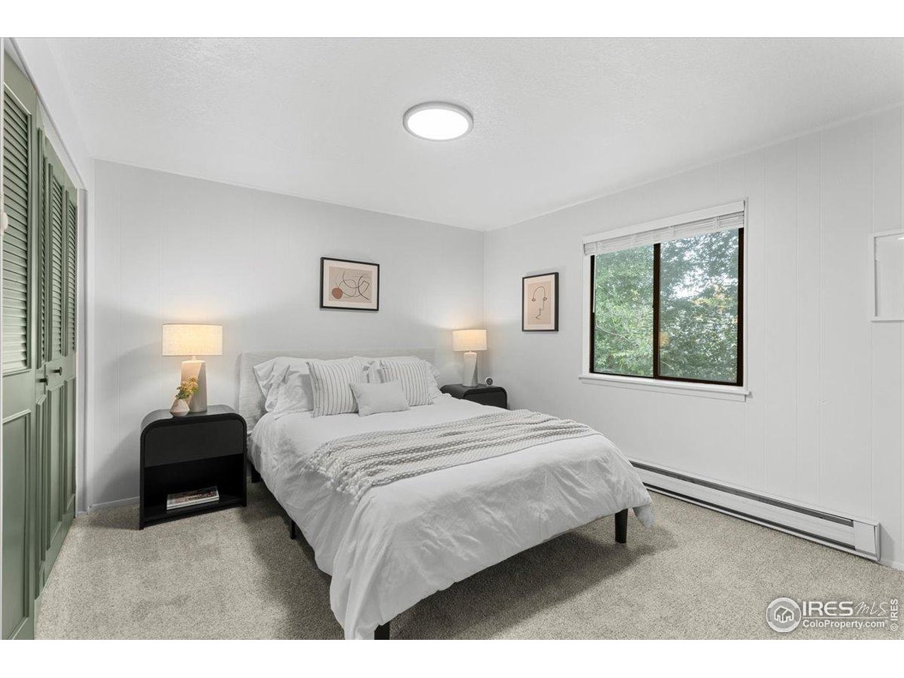 1200 Pomona Street, Unit Q & R Fort Collins, CO 80521 - Photo 18 of 32 a bedroom with a bed and a window