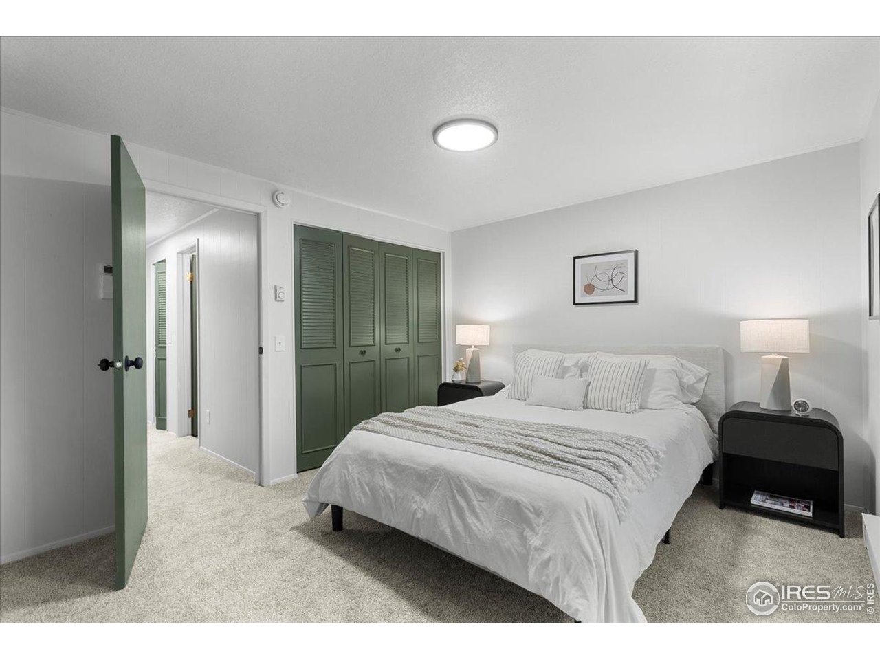 1200 Pomona Street, Unit Q & R Fort Collins, CO 80521 - Photo 20 of 32 a bedroom with a bed and a view of bathroom