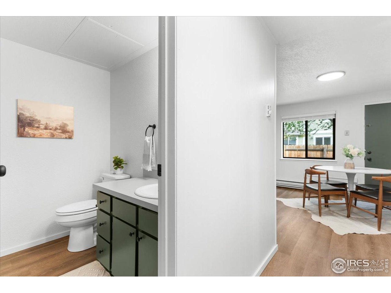 1200 Pomona Street, Unit Q & R Fort Collins, CO 80521 - Photo 8 of 32 a workspace room with wooden floor furniture and windows