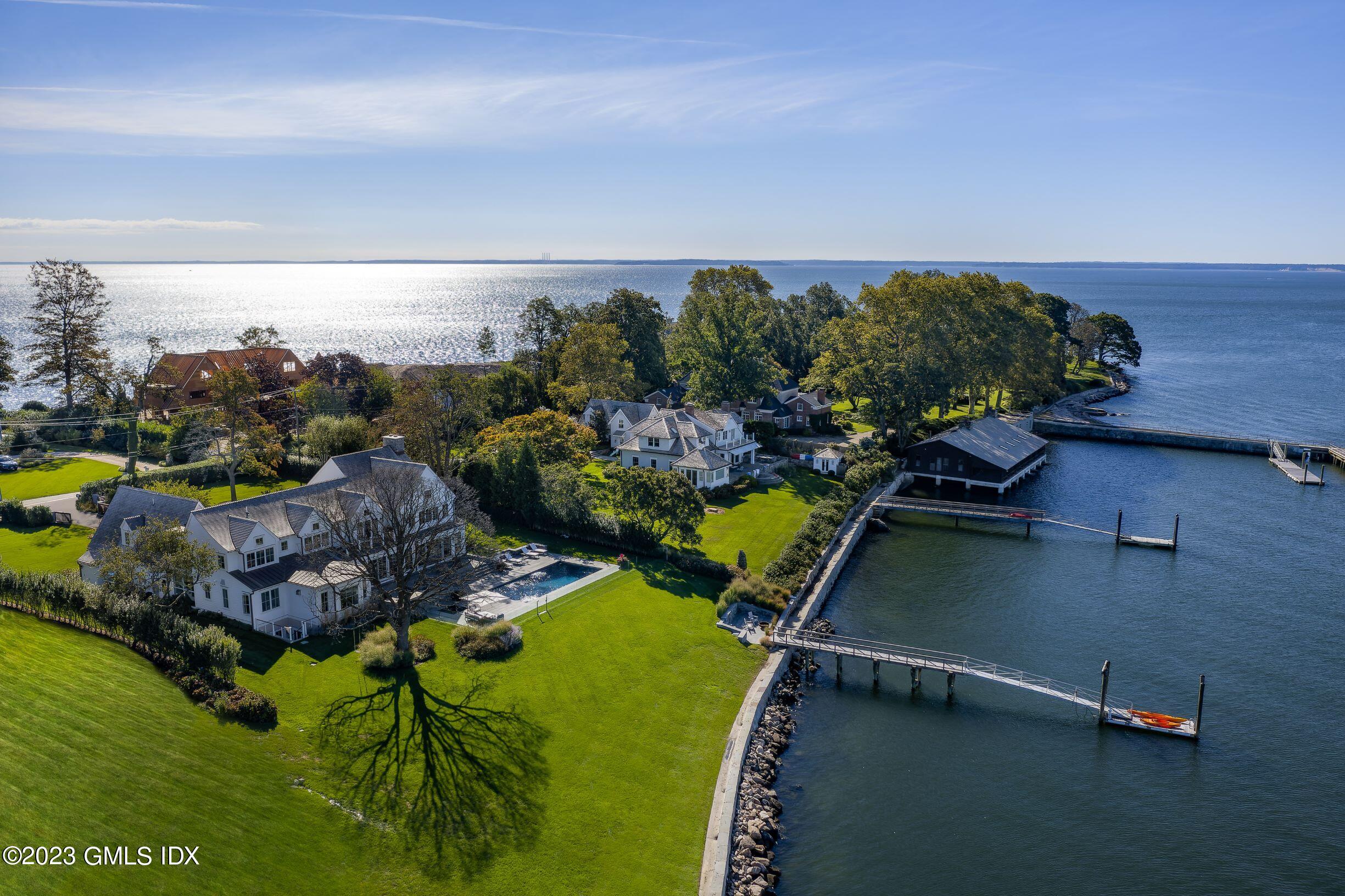 Restricted Address Darien, CT 06820 - Photo 1 of 1 an aerial view of a house with a yard basket ball court and outdoor seating