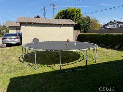 a view of a backyard of a house