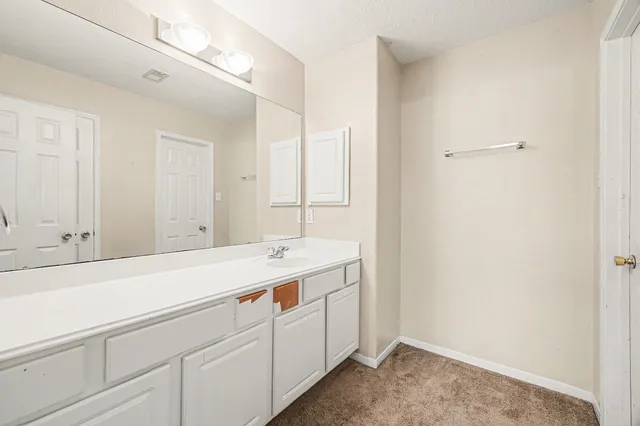 a utility room with cabinets