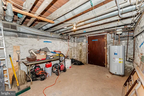 a view of storage and utility room