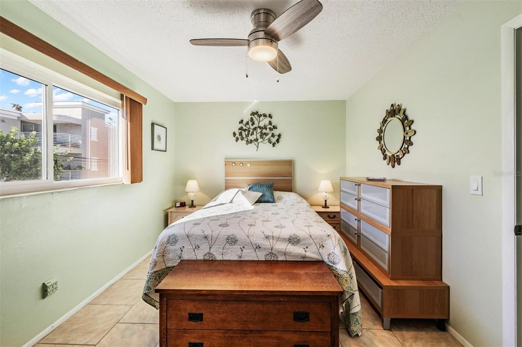 2110 Gulf Boulevard, Unit 8 Indian Rocks Beach, FL 33785 - Photo 19 of 34 a bedroom with a bed and window