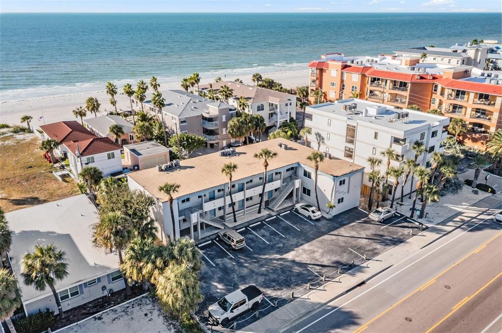 2110 Gulf Boulevard, Unit 8 Indian Rocks Beach, FL 33785 - Photo 22 of 34 an aerial view of a house with a ocean view