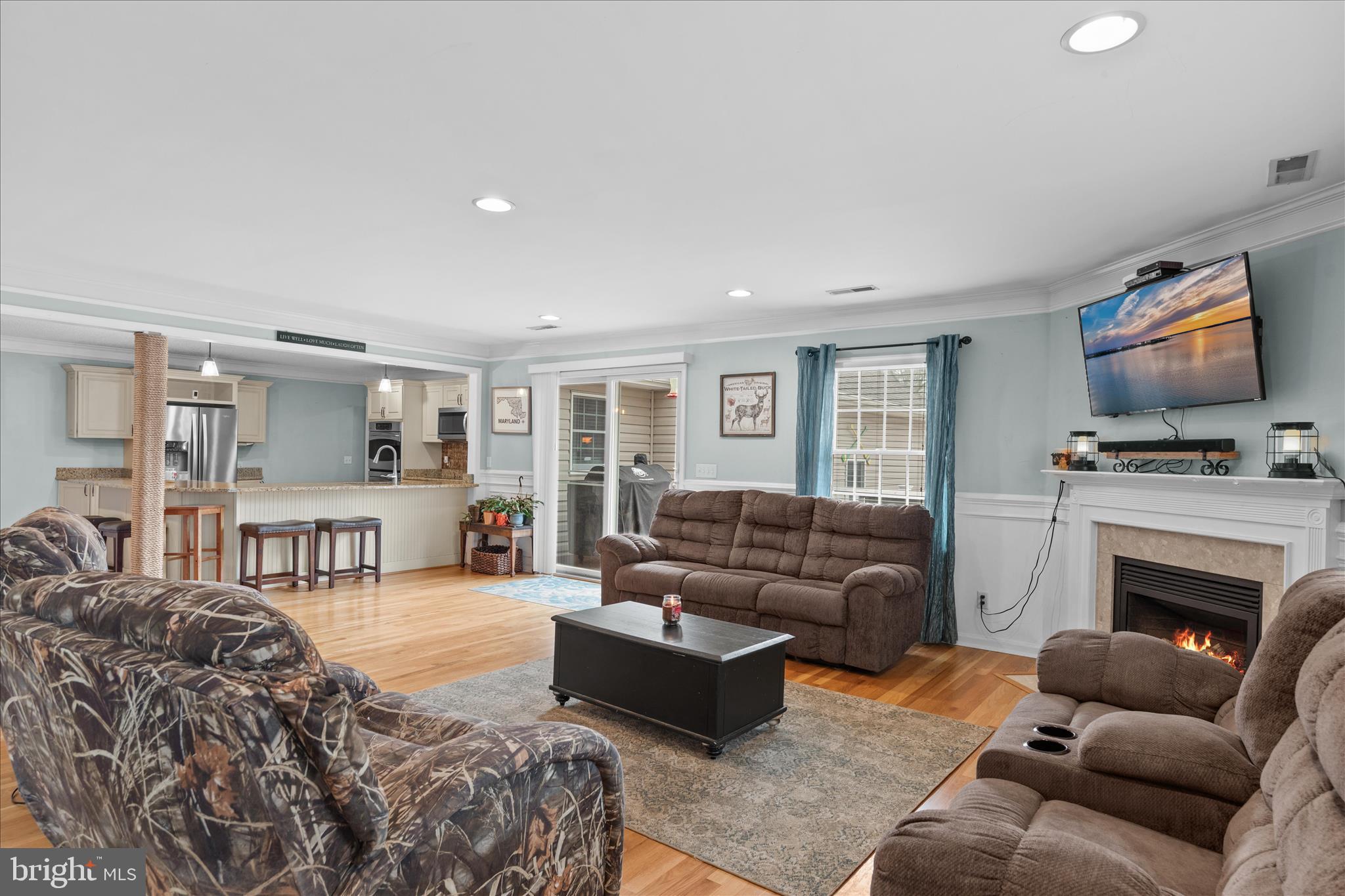 12647 Old Stage Road Bishopville, MD 21813 - Photo 46 of 84 a living room with furniture and a fireplace