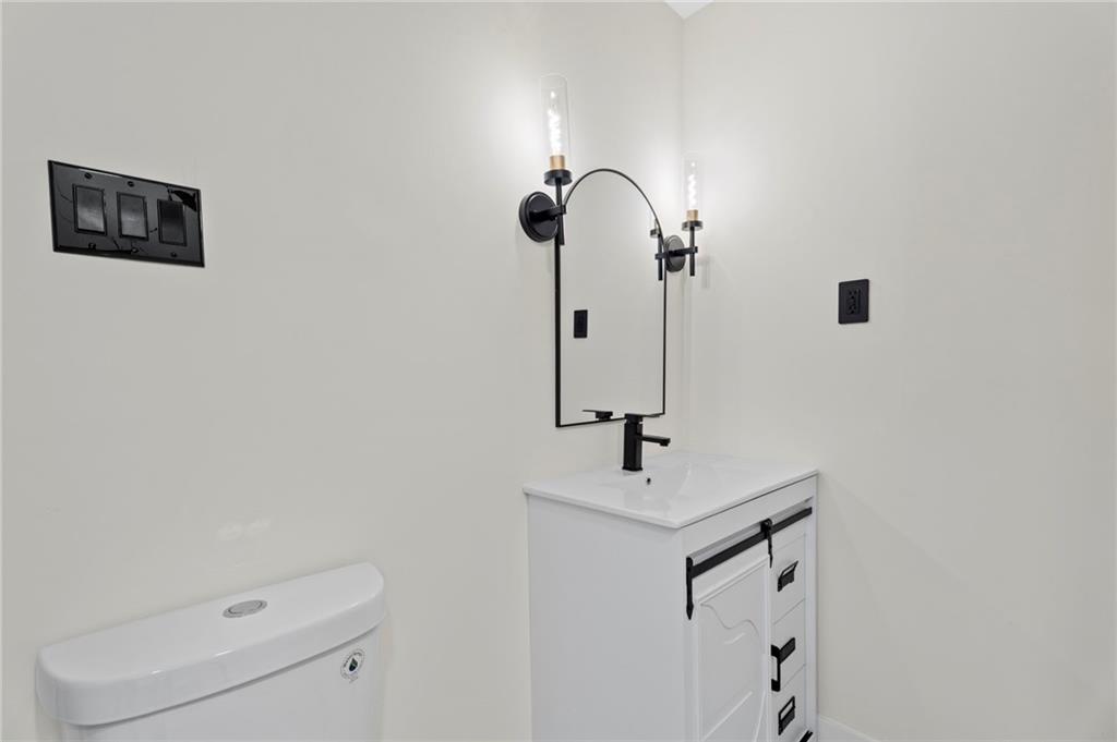 3991 Lindsey Drive Decatur, GA 30035 - Photo 13 of 29 a bathroom with a shower a sink and mirror