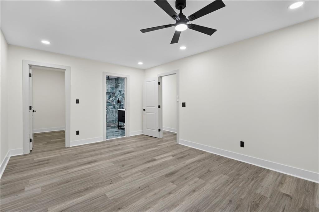 3991 Lindsey Drive Decatur, GA 30035 - Photo 16 of 29 a view of an empty room with wooden floor