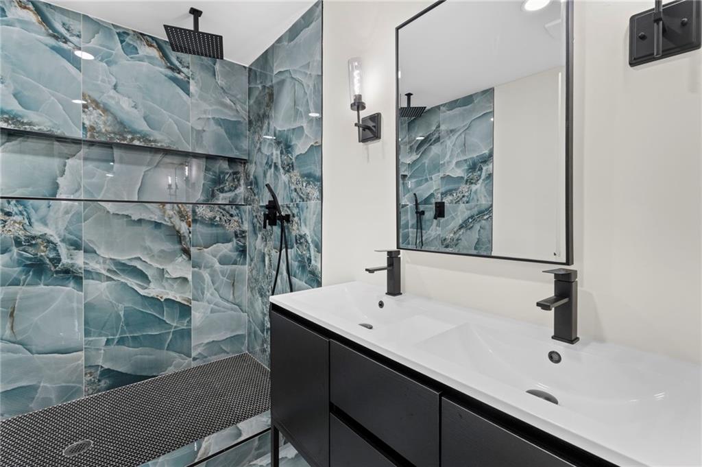 3991 Lindsey Drive Decatur, GA 30035 - Photo 19 of 29 a bathroom with a sink and mirror