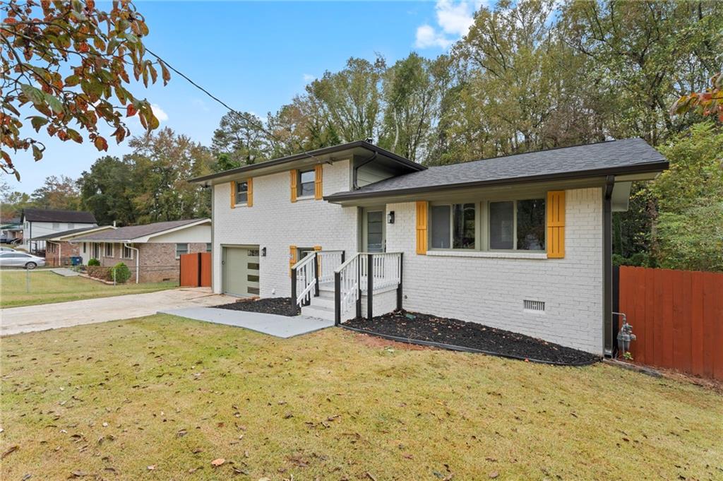 3991 Lindsey Drive Decatur, GA 30035 - Photo 5 of 29 a front view of a house with a yard