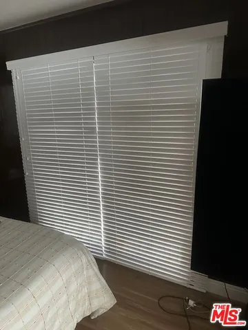 a view of a room with a window