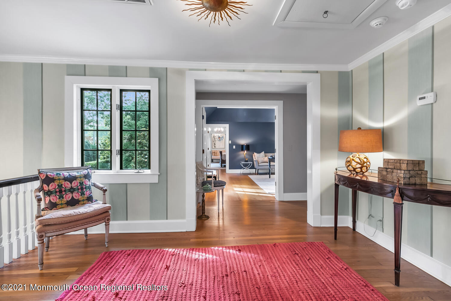 162 Black Point Road Rumson, NJ 07760 - Photo 35 of 58 a living room with furniture and a table