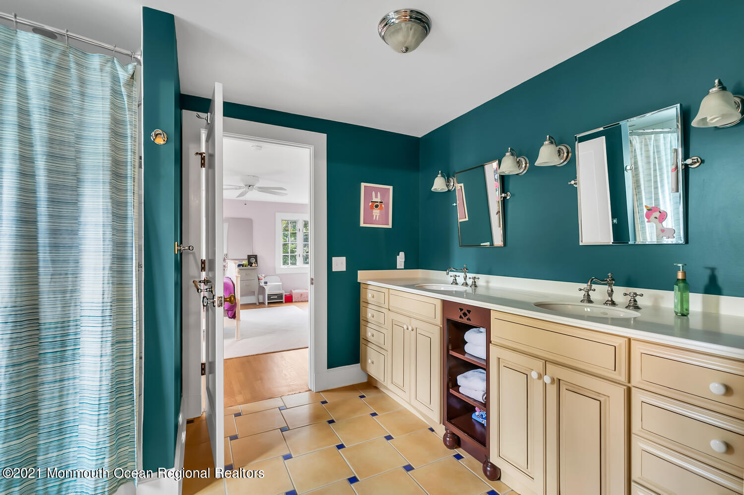 162 Black Point Road Rumson, NJ 07760 - Photo 39 of 58 a bathroom with a sink double vanity and a mirror