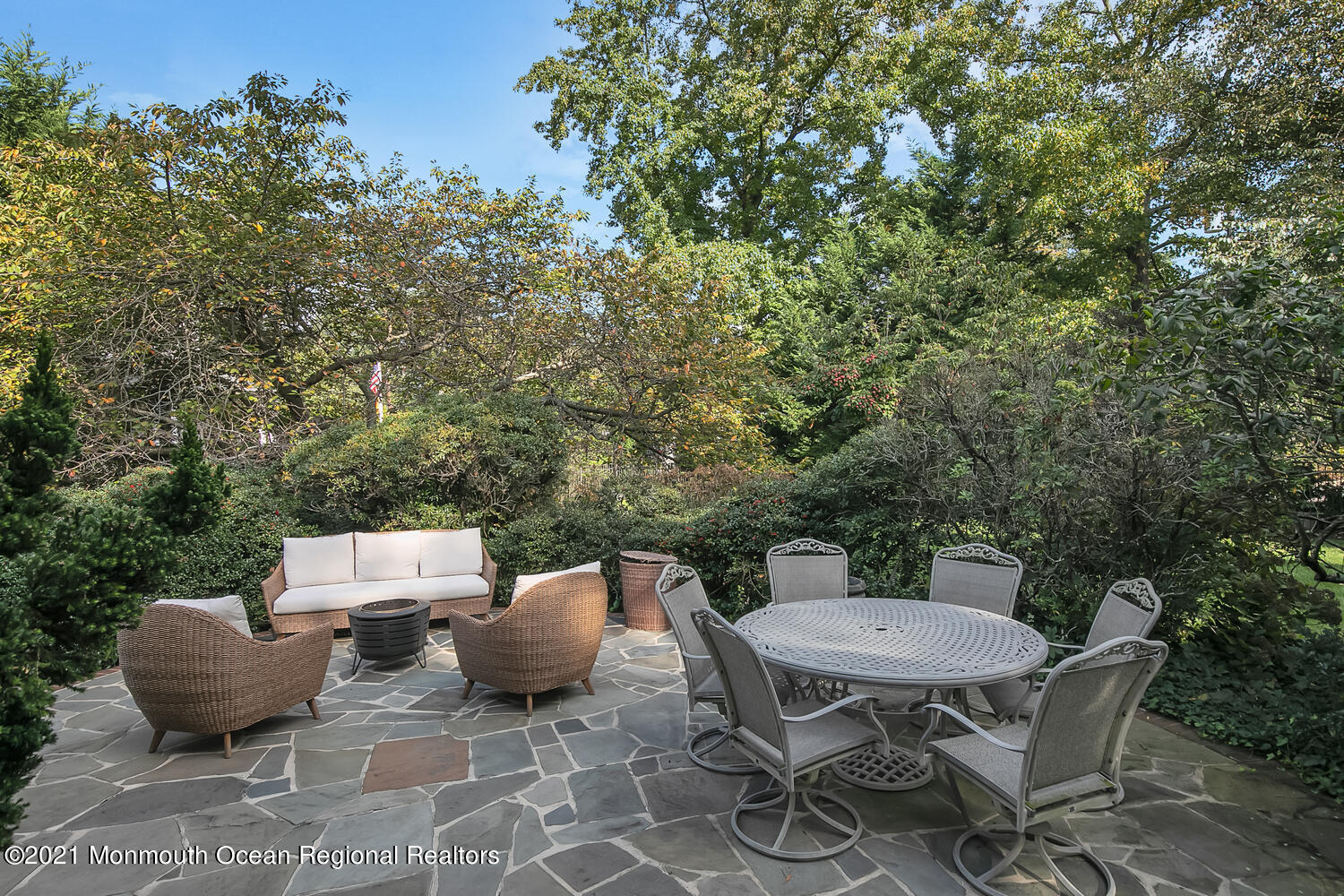162 Black Point Road Rumson, NJ 07760 - Photo 42 of 58 a backyard of a house with table and chairs