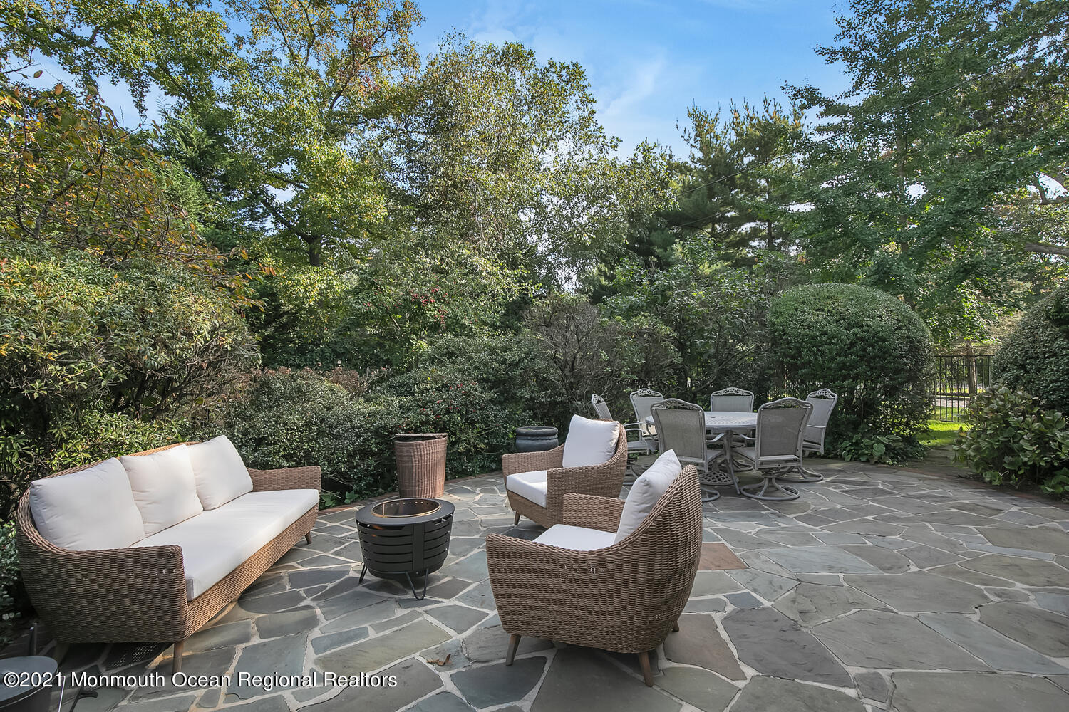 162 Black Point Road Rumson, NJ 07760 - Photo 43 of 58 a view of a patio with couches chairs and a potted plant