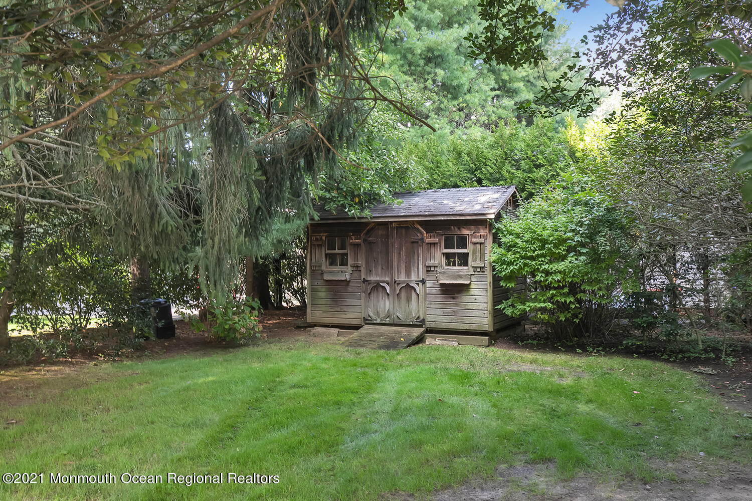 162 Black Point Road Rumson, NJ 07760 - Photo 53 of 58 a view of a house with a yard and sitting area