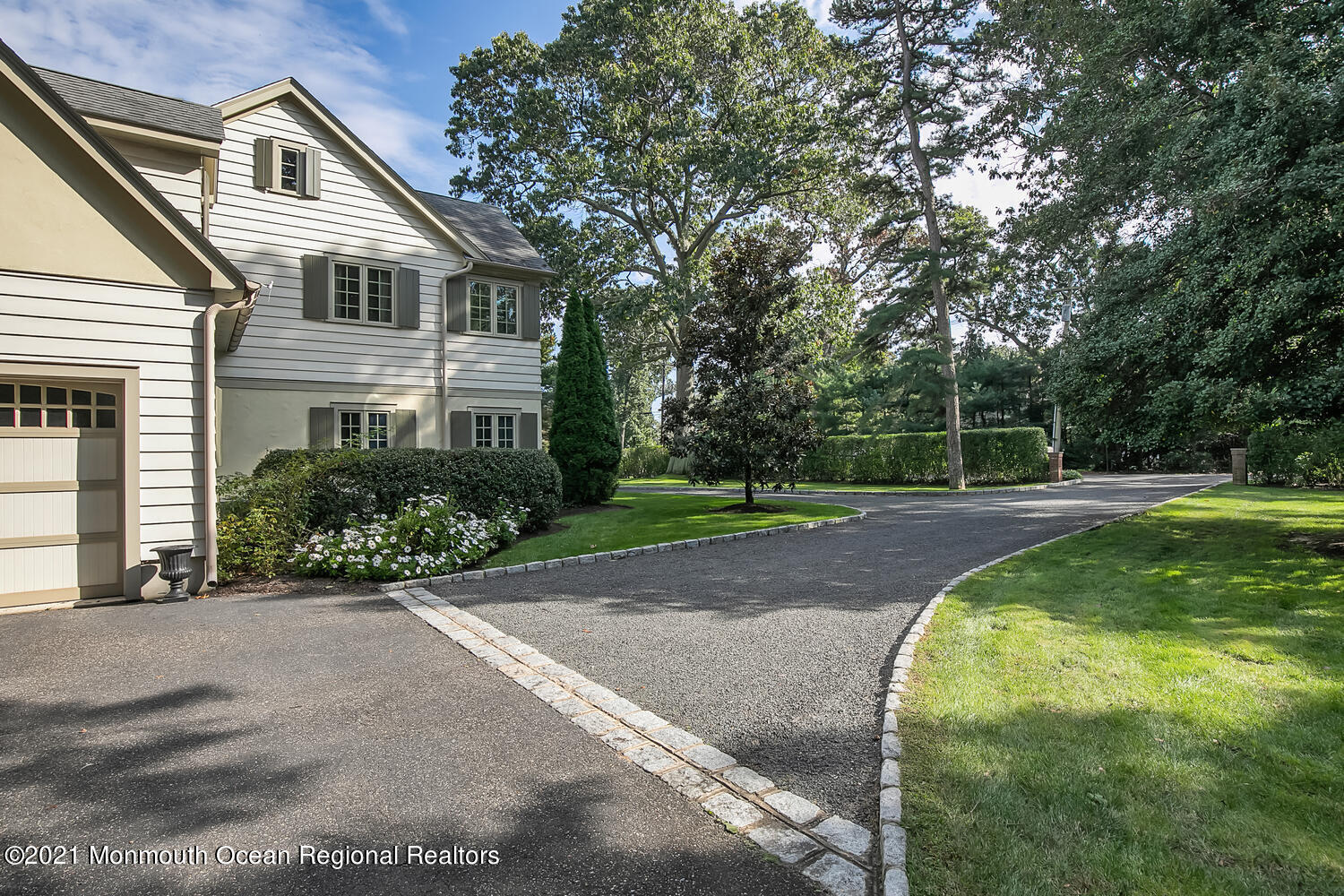 162 Black Point Road Rumson, NJ 07760 - Photo 55 of 58 a front view of a house with a yard