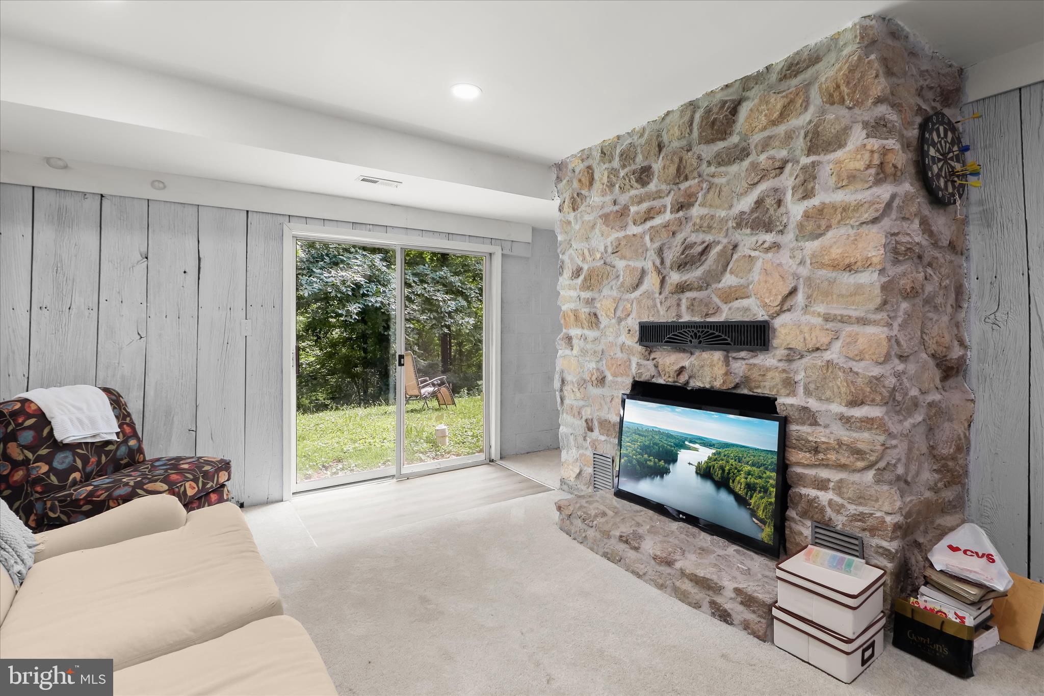 14213 Longnecker Road Reisterstown, MD 21136 - Photo 22 of 44 a living room with furniture and a fireplace