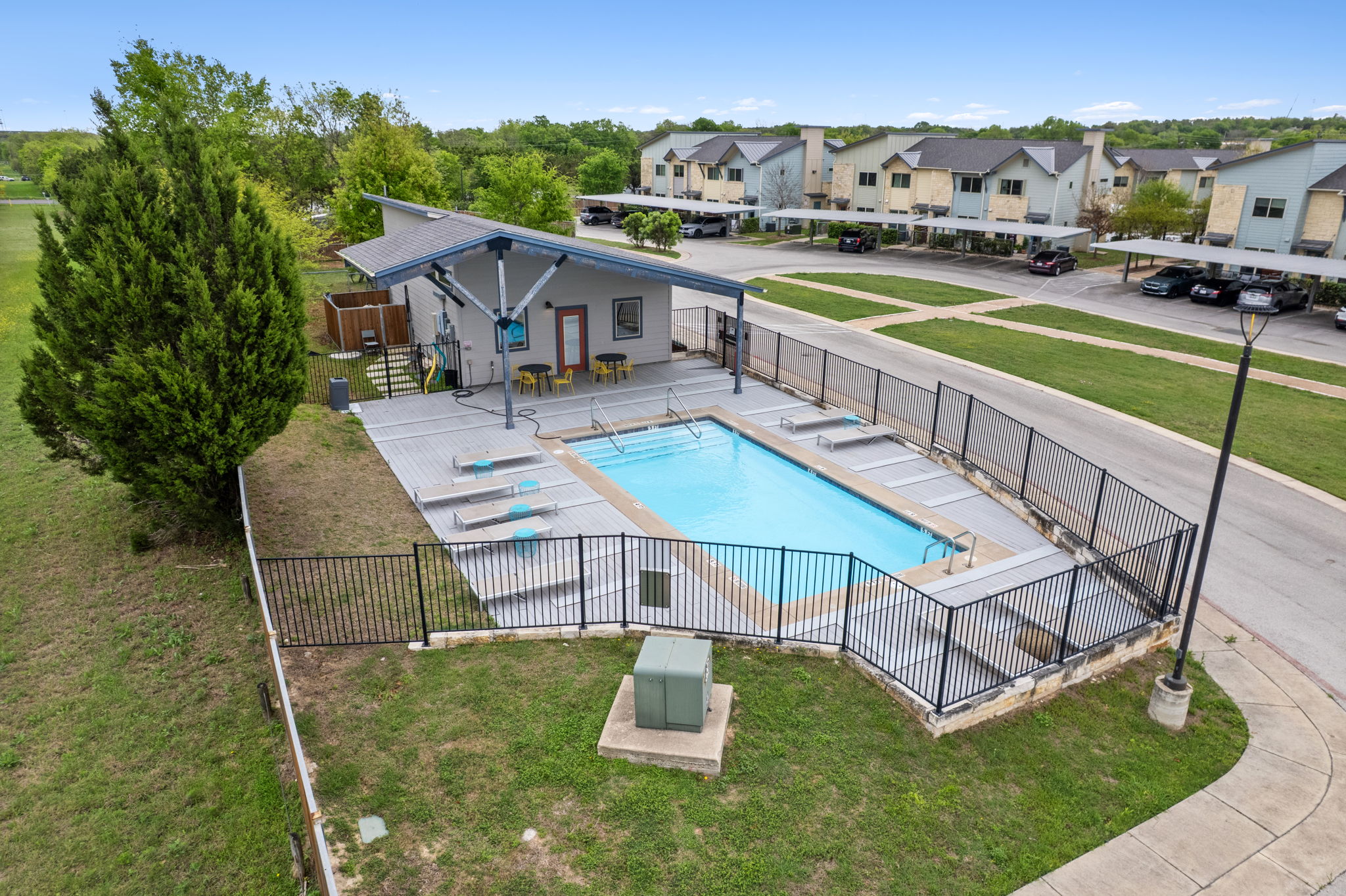 7805 Cooper Lane, Unit 606 Austin, TX 78745 - Photo 33 of 35 an aerial view of a house with swimming pool garden and mountain view
