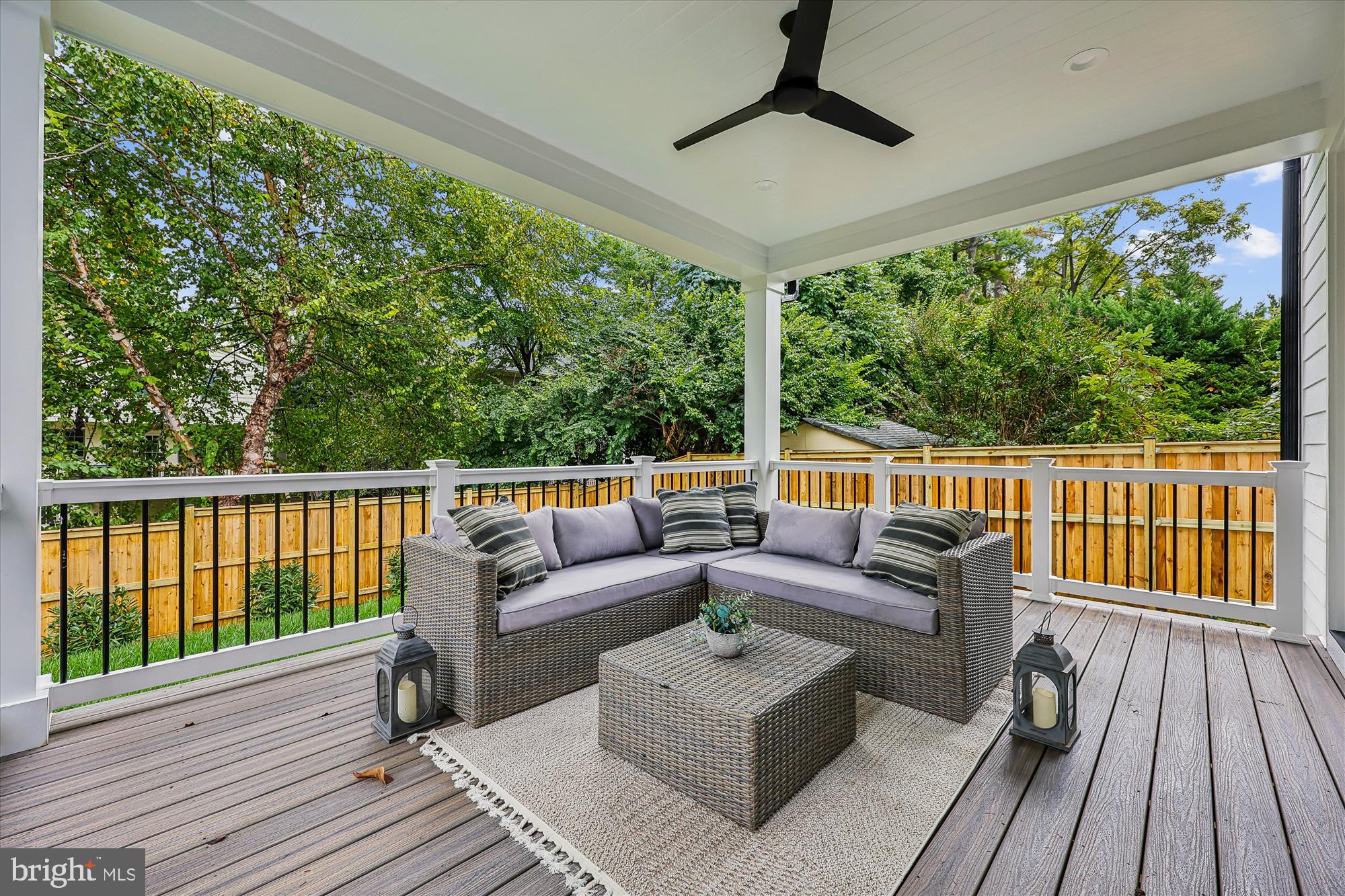 5605 Glenwood Road Bethesda, MD 20817 - Photo 23 of 57 a balcony with furniture and wooden floor