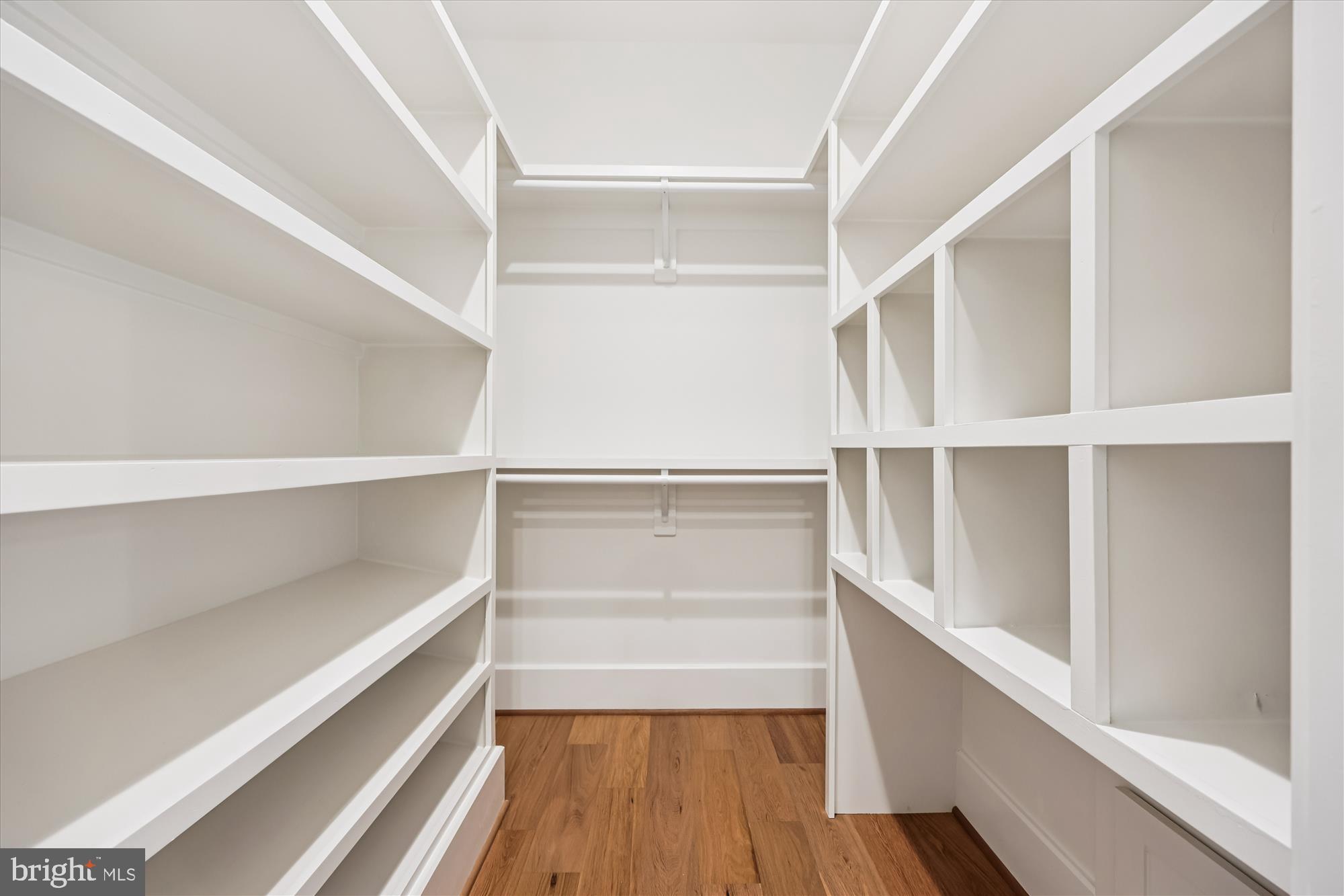 5605 Glenwood Road Bethesda, MD 20817 - Photo 29 of 57 a view of walk in closet with empty racks