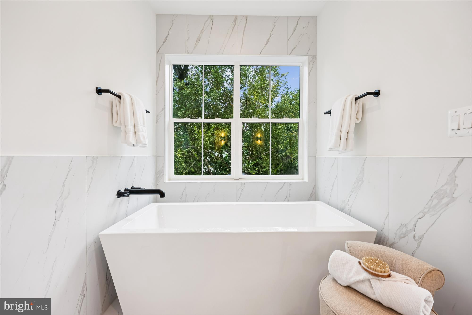 5605 Glenwood Road Bethesda, MD 20817 - Photo 32 of 57 a bathroom with a bathtub and a shower