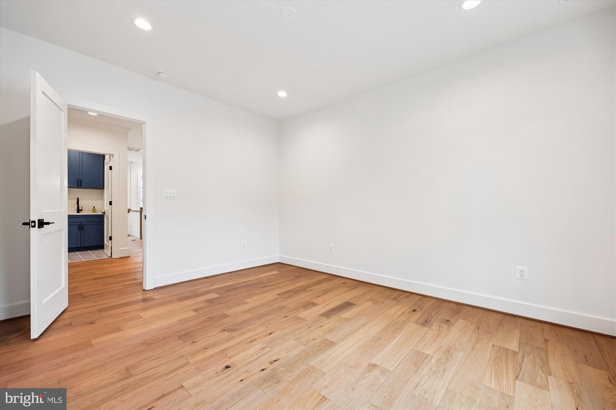 5605 Glenwood Road Bethesda, MD 20817 - Photo 40 of 57 a view of livingroom with wooden floor