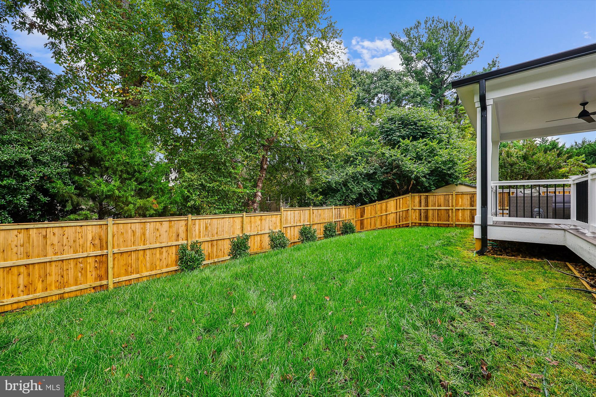 5605 Glenwood Road Bethesda, MD 20817 - Photo 56 of 57 a view of a backyard with a small garden