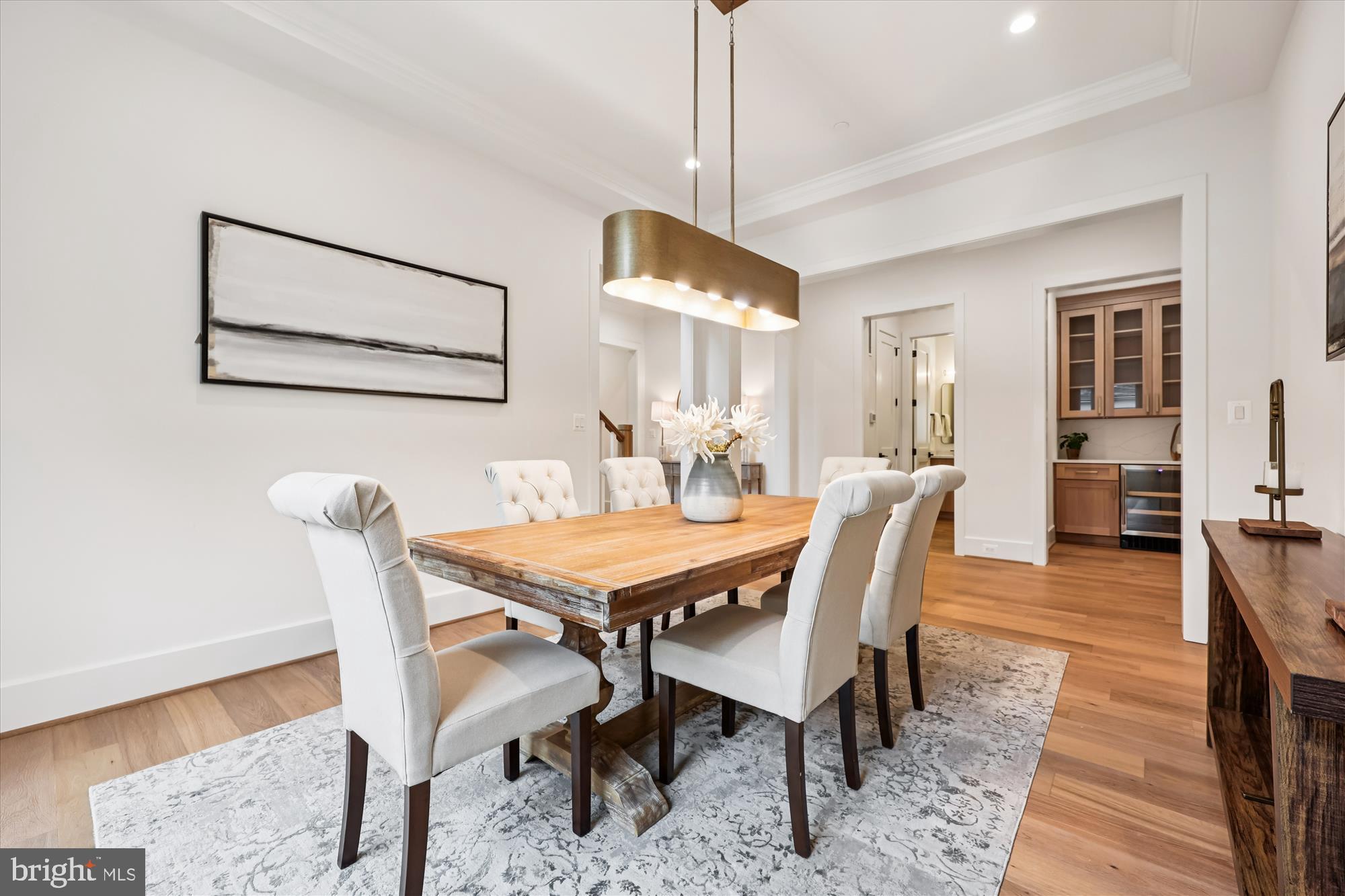 5605 Glenwood Road Bethesda, MD 20817 - Photo 10 of 57 a dining room with furniture and wooden floor