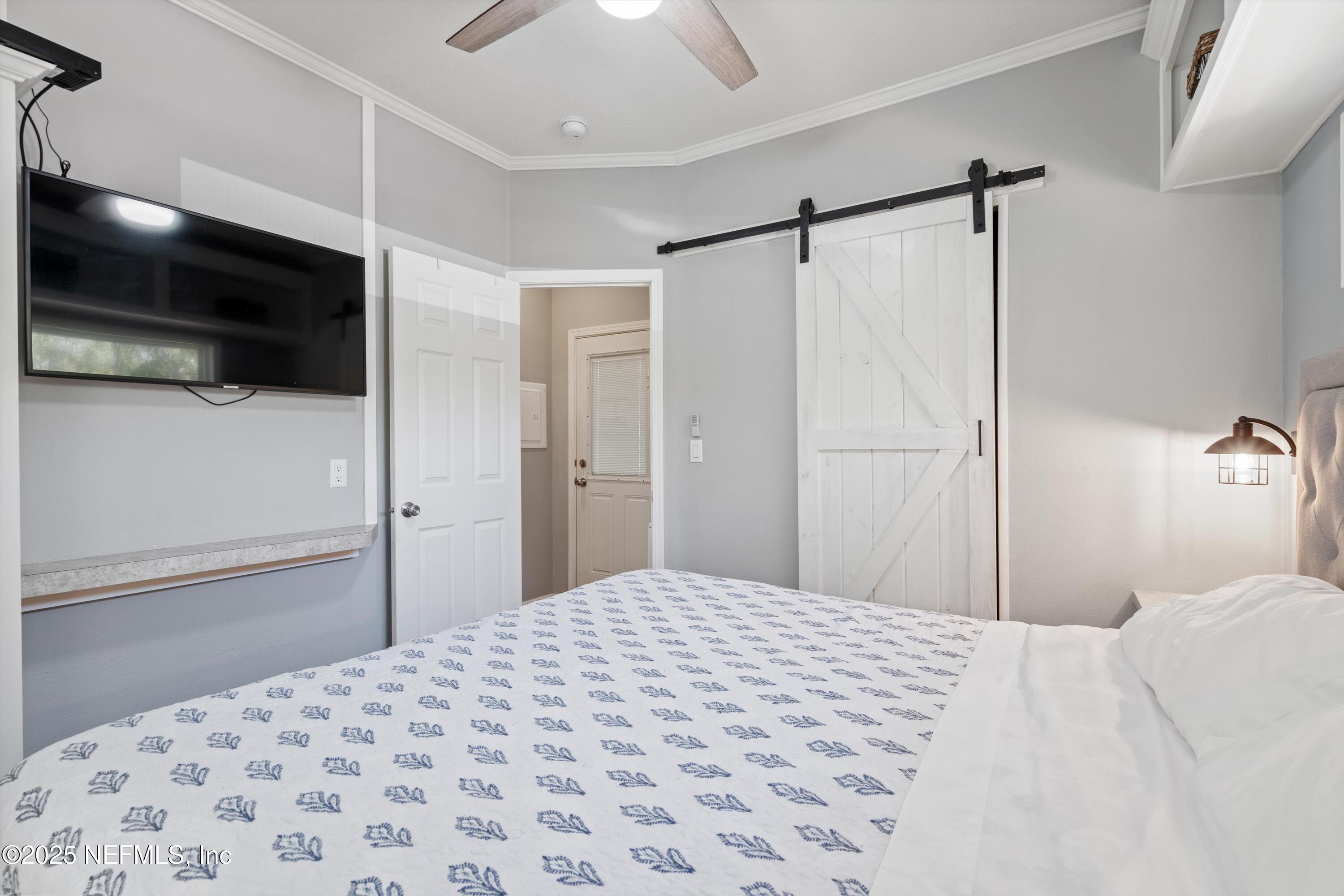 14058 Northeast 252nd Terrace Road Salt Springs, FL 32134 - Photo 17 of 36 Primary Bedroom