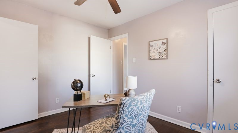 2313 Ruffin Road Richmond, VA 23234 - Photo 12 of 40 a view of a workspace with furniture and wooden floor