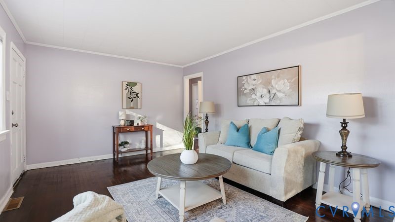 2313 Ruffin Road Richmond, VA 23234 - Photo 3 of 40 a living room with furniture and a table