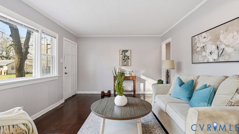 2313 Ruffin Road Richmond, VA 23234 - Photo 33 of 40 a living room with furniture and a table