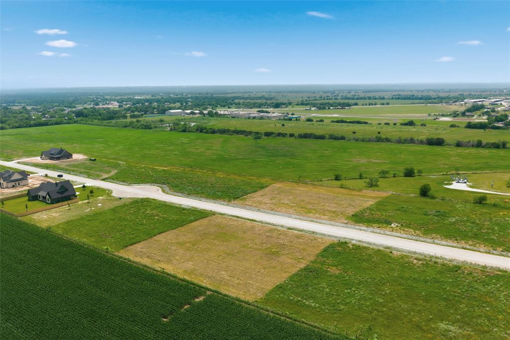 268 Lacek Mill Road China Spring, TX 76633 - Photo 4 of 10 a view of a green field near an ocean