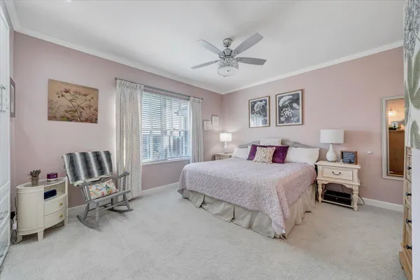 a view of a house with backyard and a yard