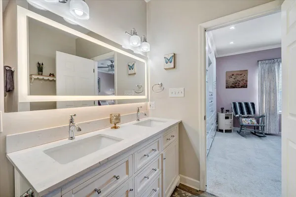 a front view of a house with a yard and sitting space