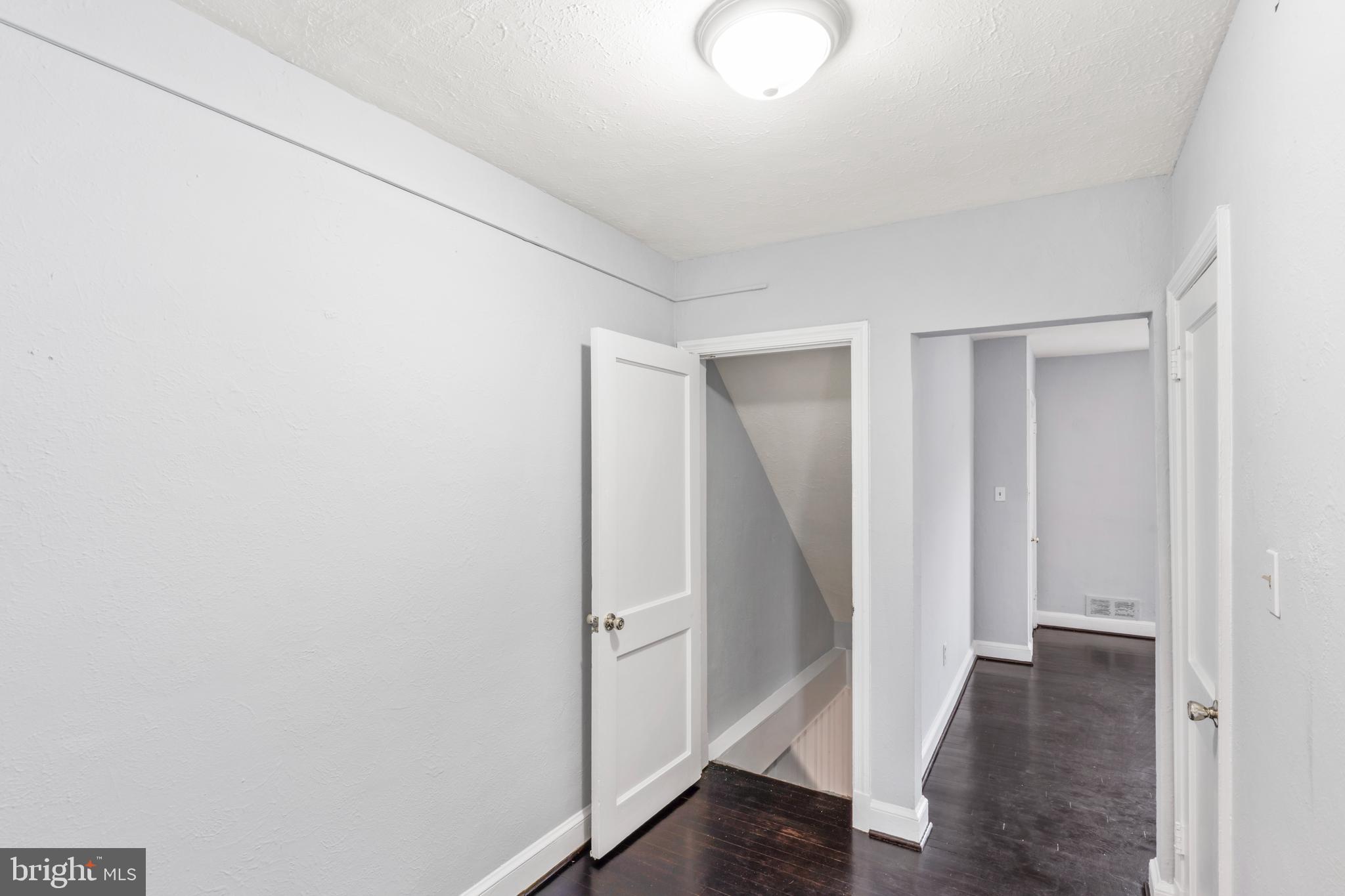 1209 Savannah Street Southeast Washington, DC 20032 - Photo 14 of 27 a view of a room with wooden floor