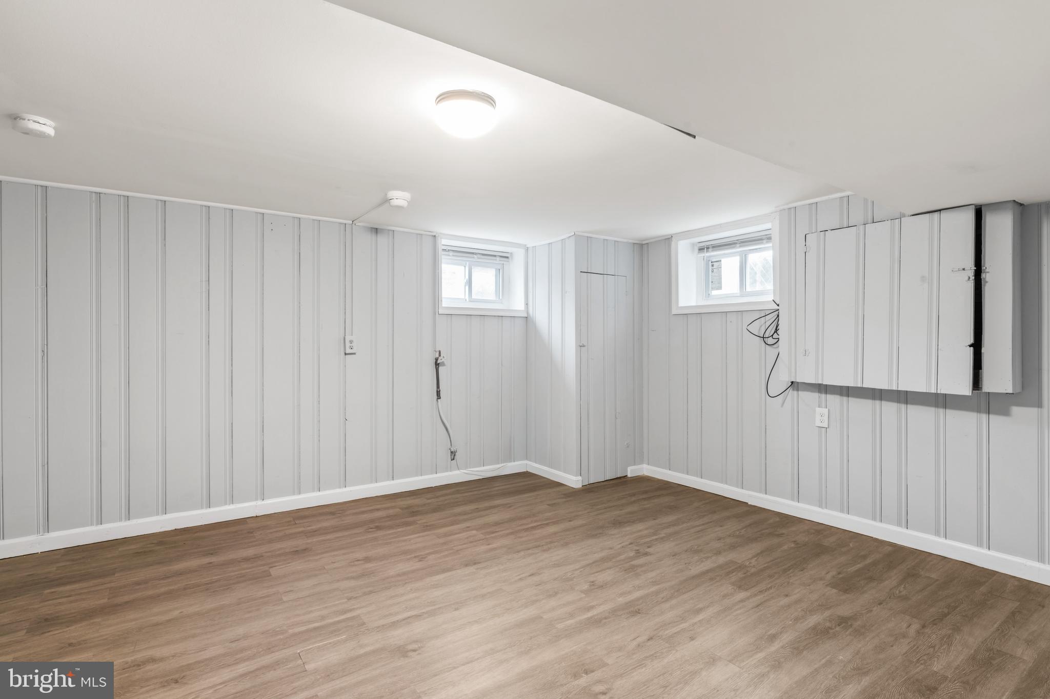1209 Savannah Street Southeast Washington, DC 20032 - Photo 22 of 27 a view of an empty room with wooden floor