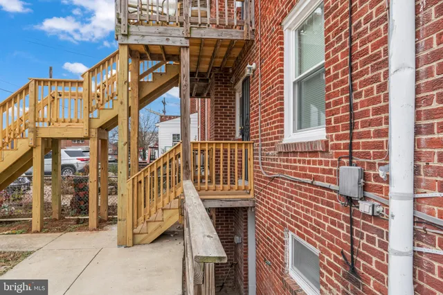 a front view of a building with a glass door