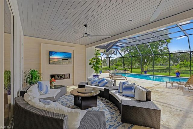 a outdoor space with patio furniture and garden view