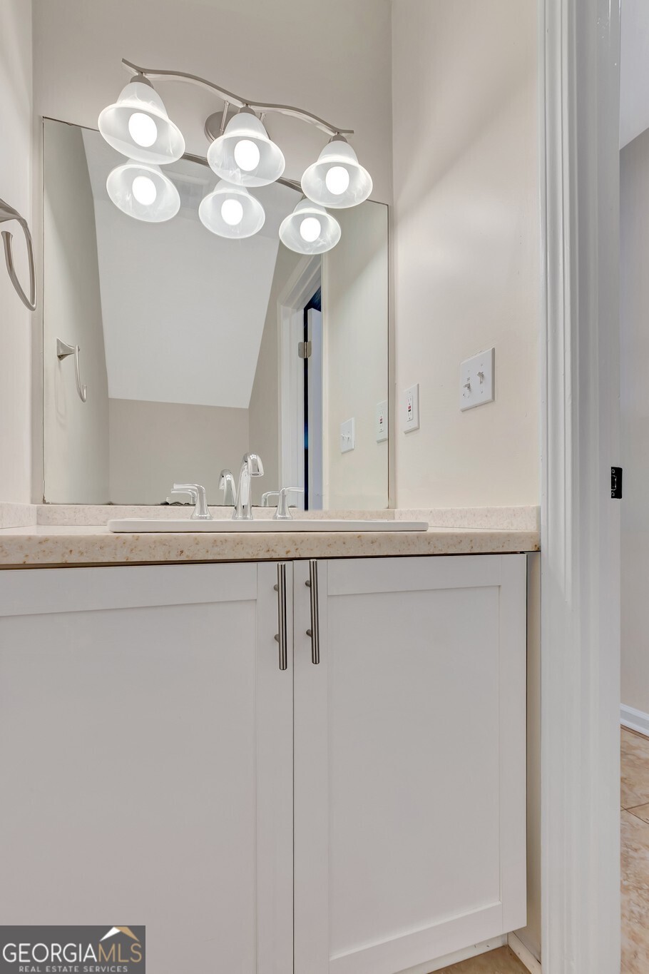 1946 Cornell Way Morrow, GA 30260 - Photo 11 of 31 a bathroom with a sink mirror and vanity