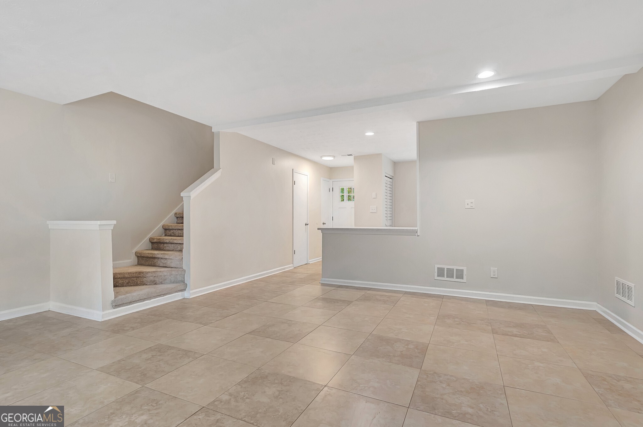 1946 Cornell Way Morrow, GA 30260 - Photo 15 of 31 a view of an empty room with a kitchen