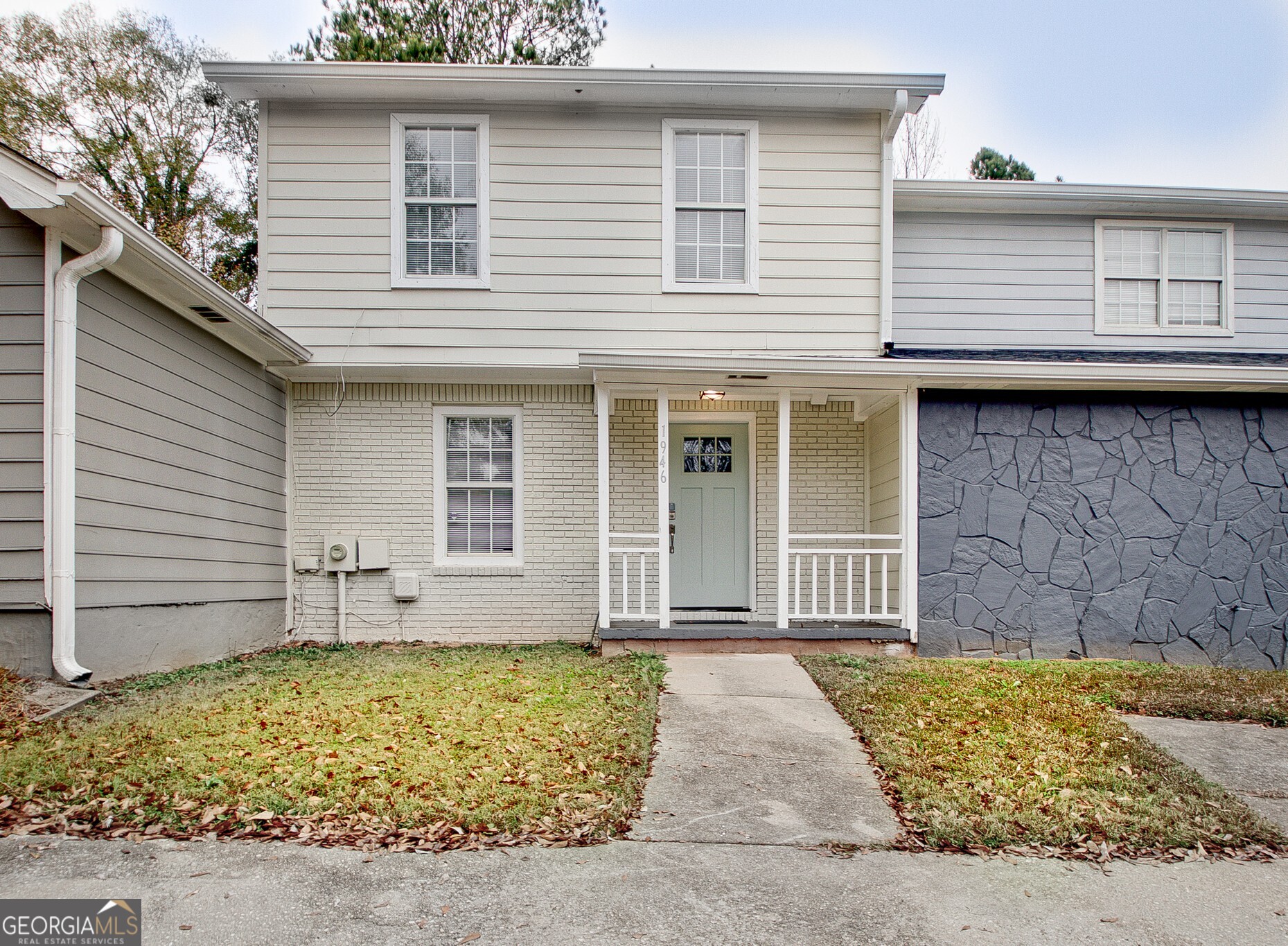 1946 Cornell Way Morrow, GA 30260 - Photo 2 of 31 a front view of a house with garden