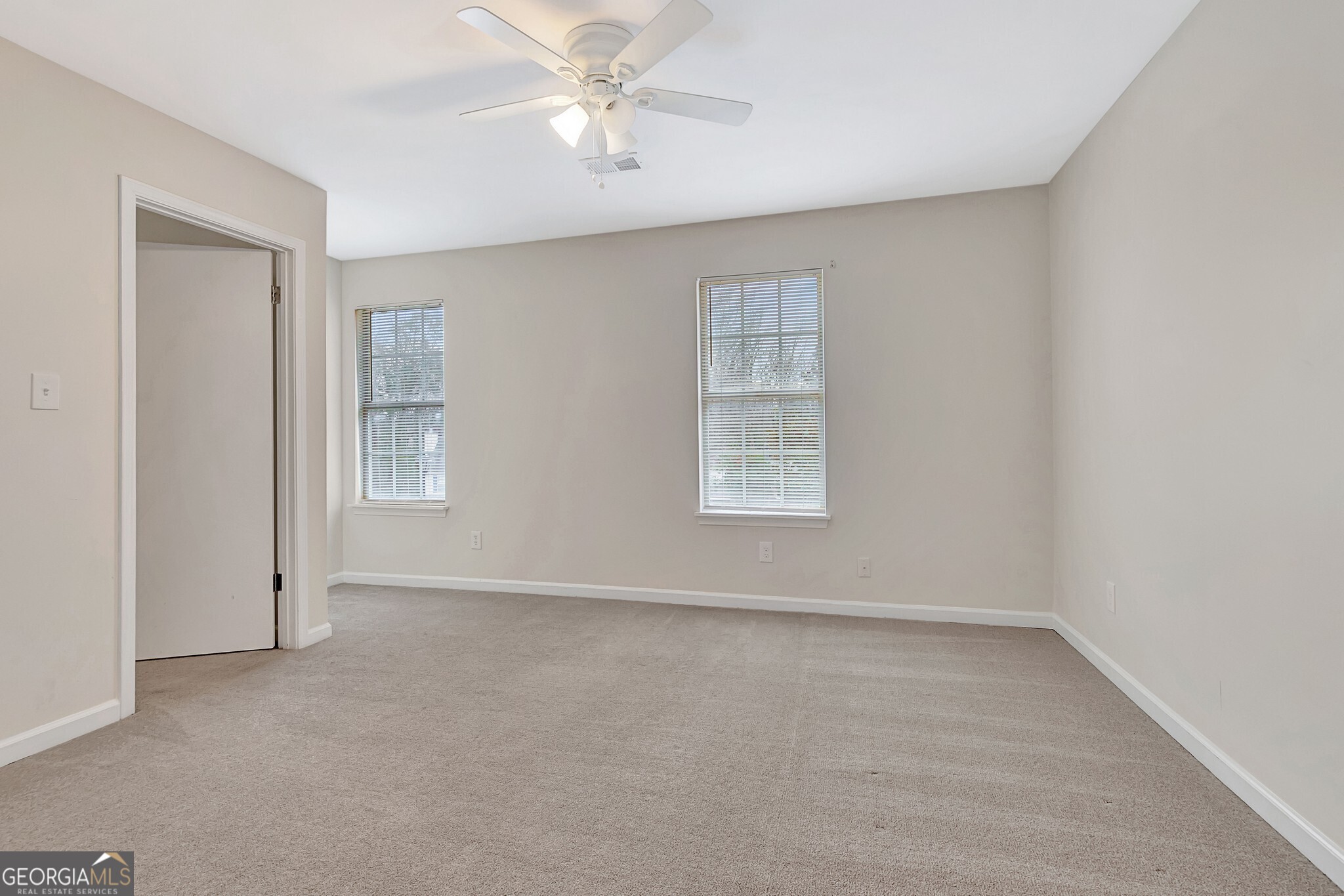 1946 Cornell Way Morrow, GA 30260 - Photo 26 of 31 wooden floor in an empty room with a window