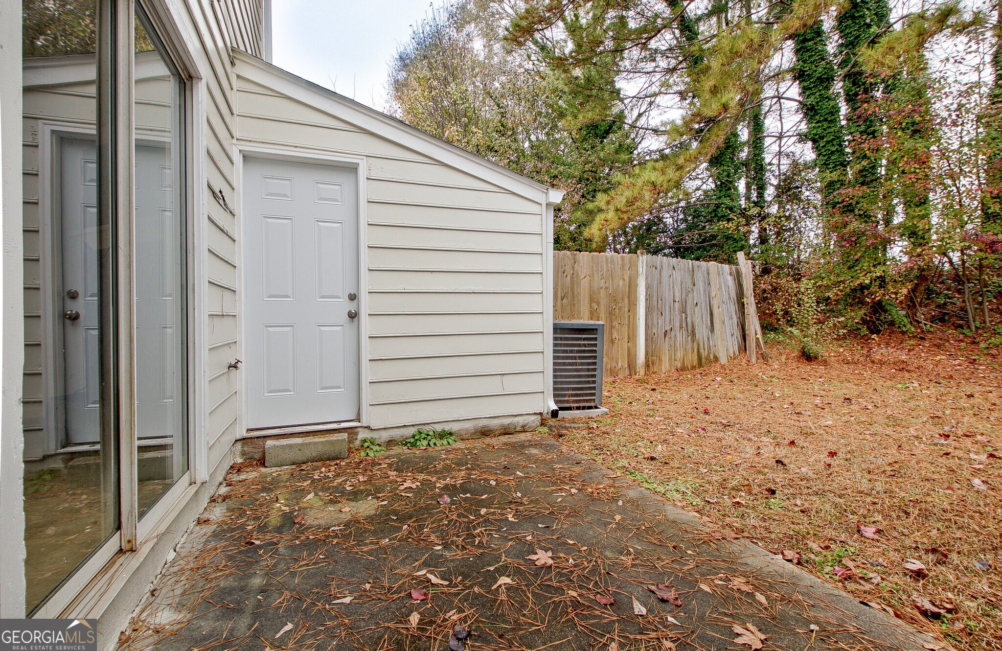 1946 Cornell Way Morrow, GA 30260 - Photo 27 of 31 a view of small house with backyard and tree