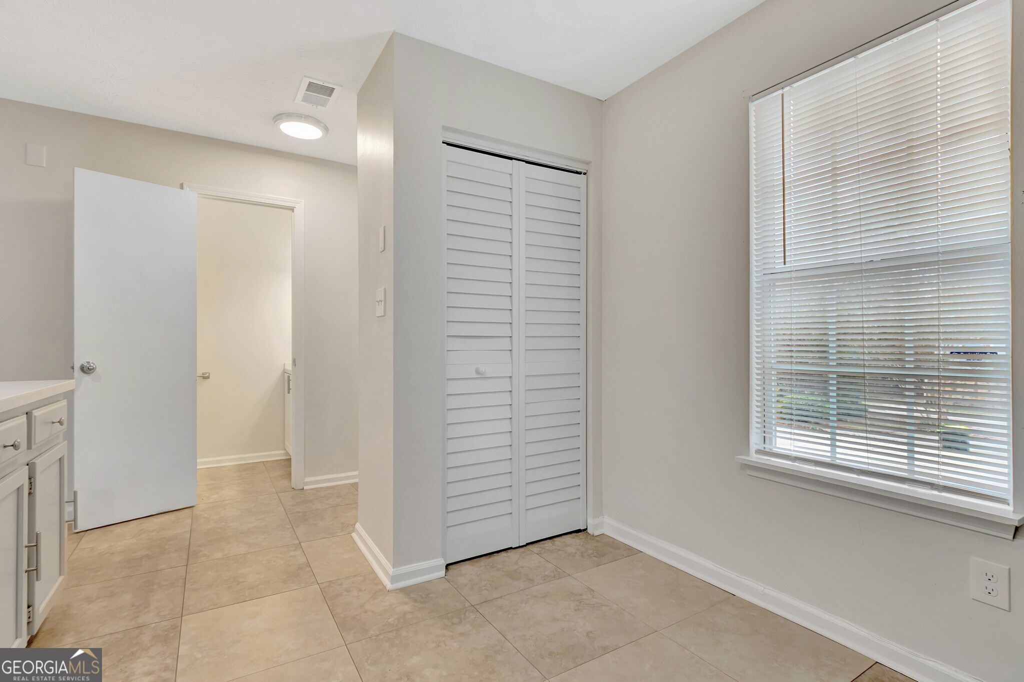 1946 Cornell Way Morrow, GA 30260 - Photo 8 of 31 a view of an empty room with a window