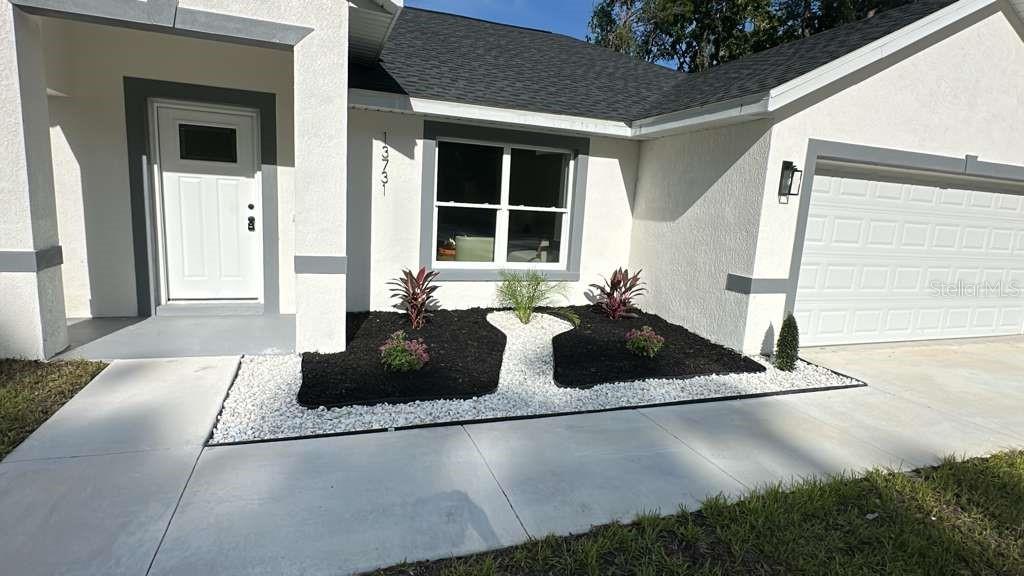 13731 Southwest 89 Circle Ocala, FL 34473 - Photo 3 of 21 a view of a house with a balcony