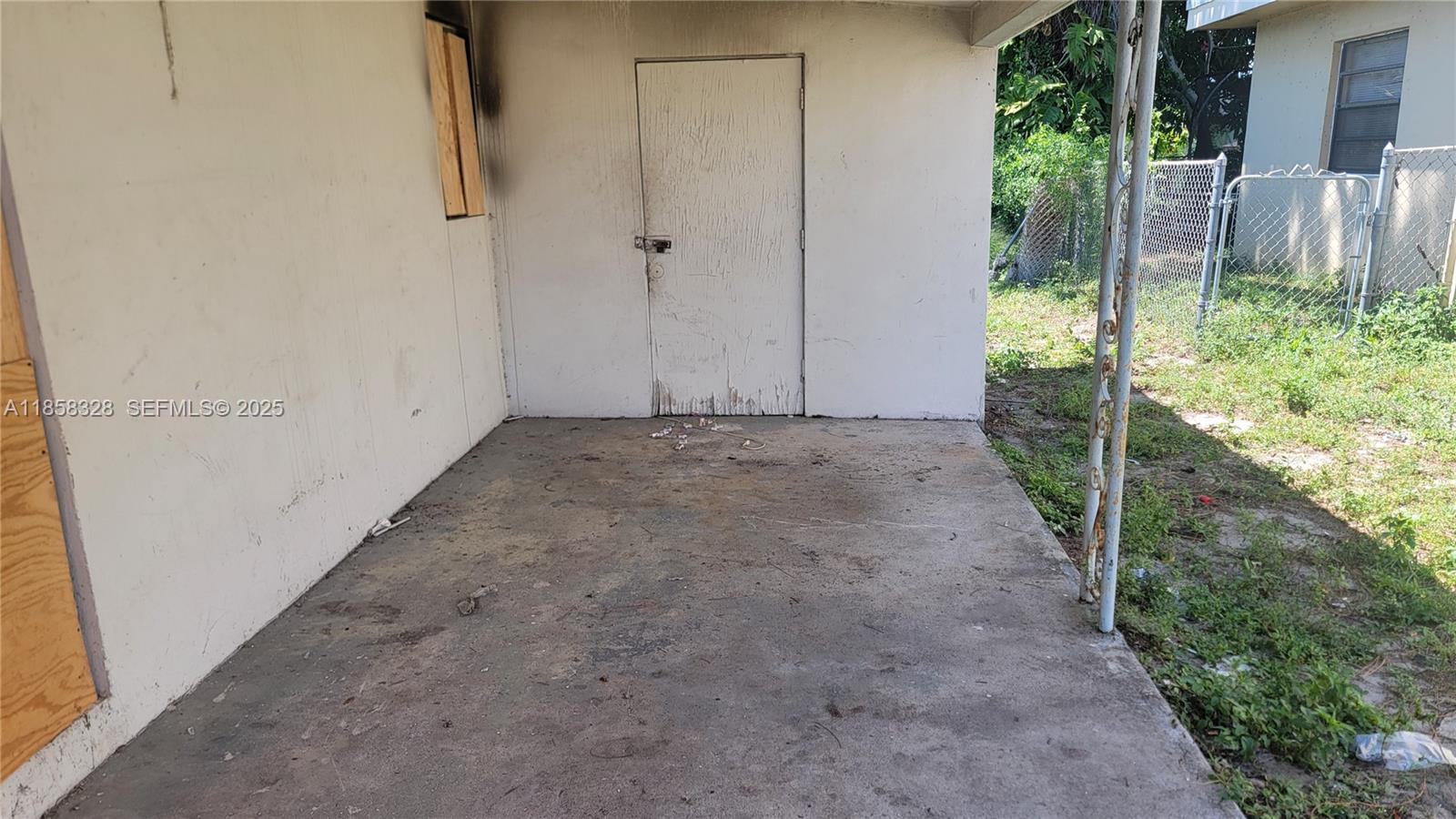 917 West 2nd Street Riviera Beach, FL 33404 - Photo 2 of 8 a view of a backyard