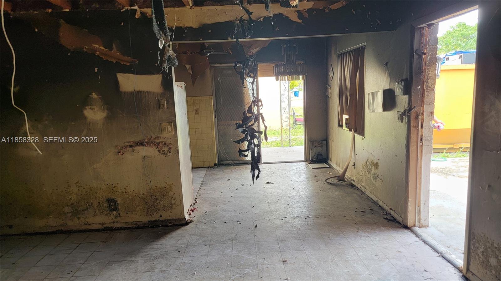 917 West 2nd Street Riviera Beach, FL 33404 - Photo 6 of 8 a view of a room with wooden door